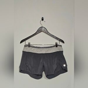 Lululemon Athletica Women’s Running Shorts Gray Stretch Zip Pocket Size 6
